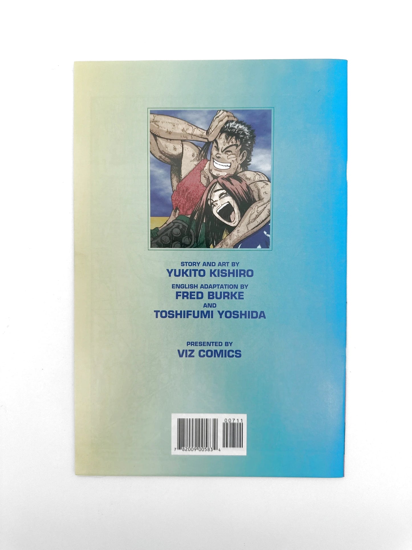 A manga comic book with a dynamic illustration of two characters and credits for the story, art, and English adaptation