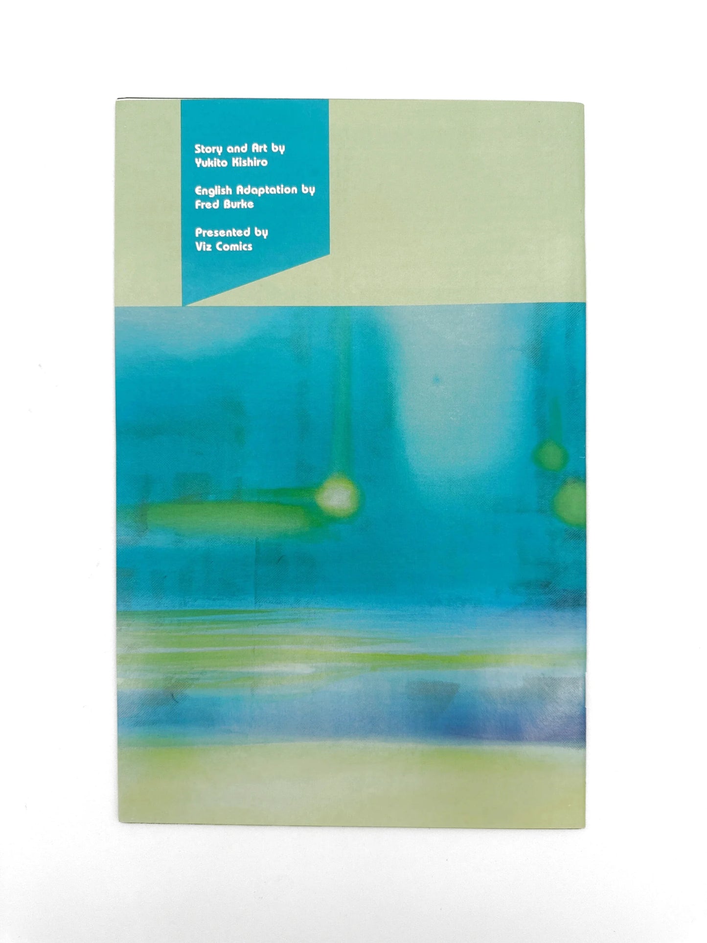 A comic book with an abstract blue and green cover.