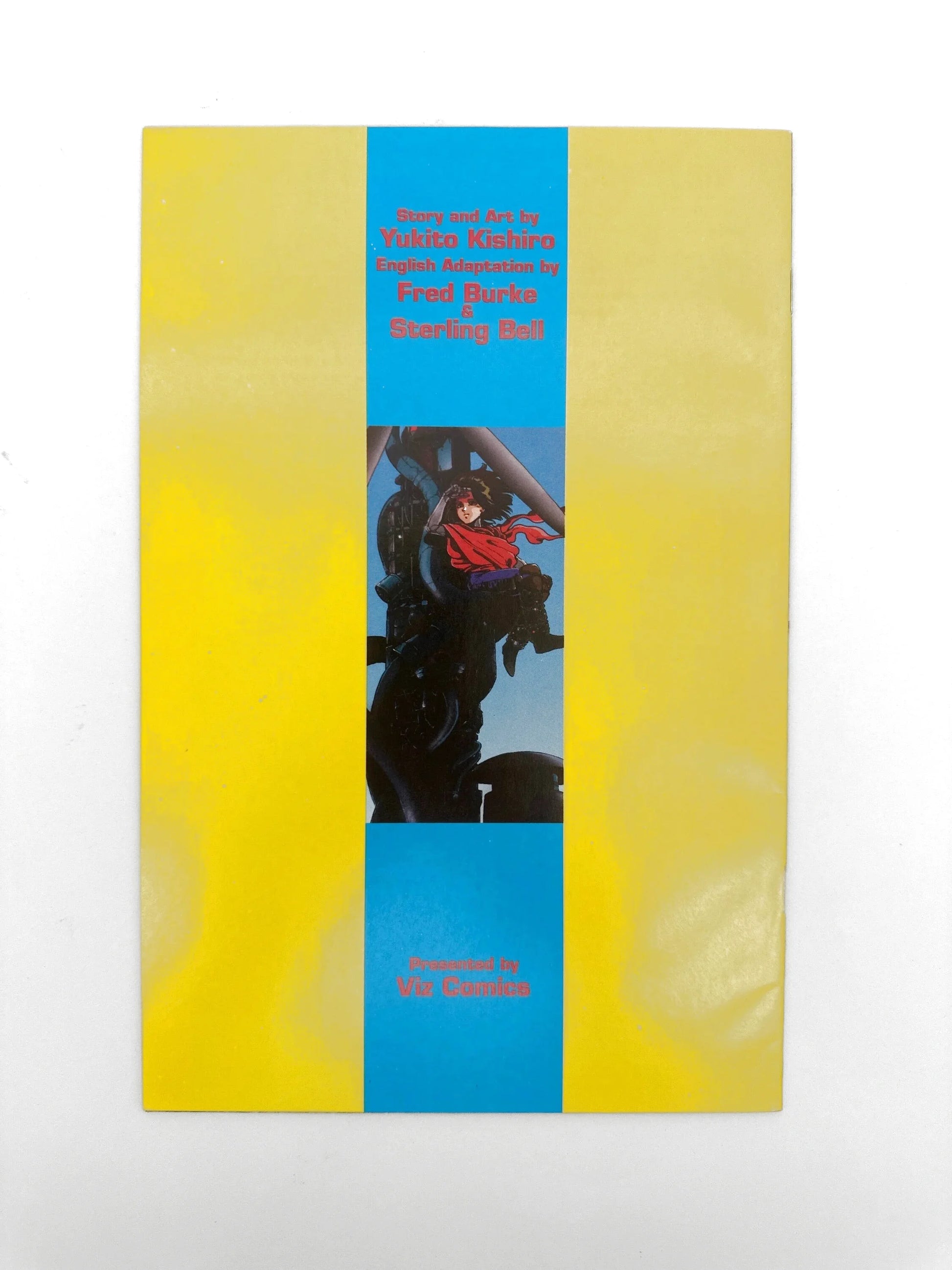 Yellow and blue book with an anime-style illustration.