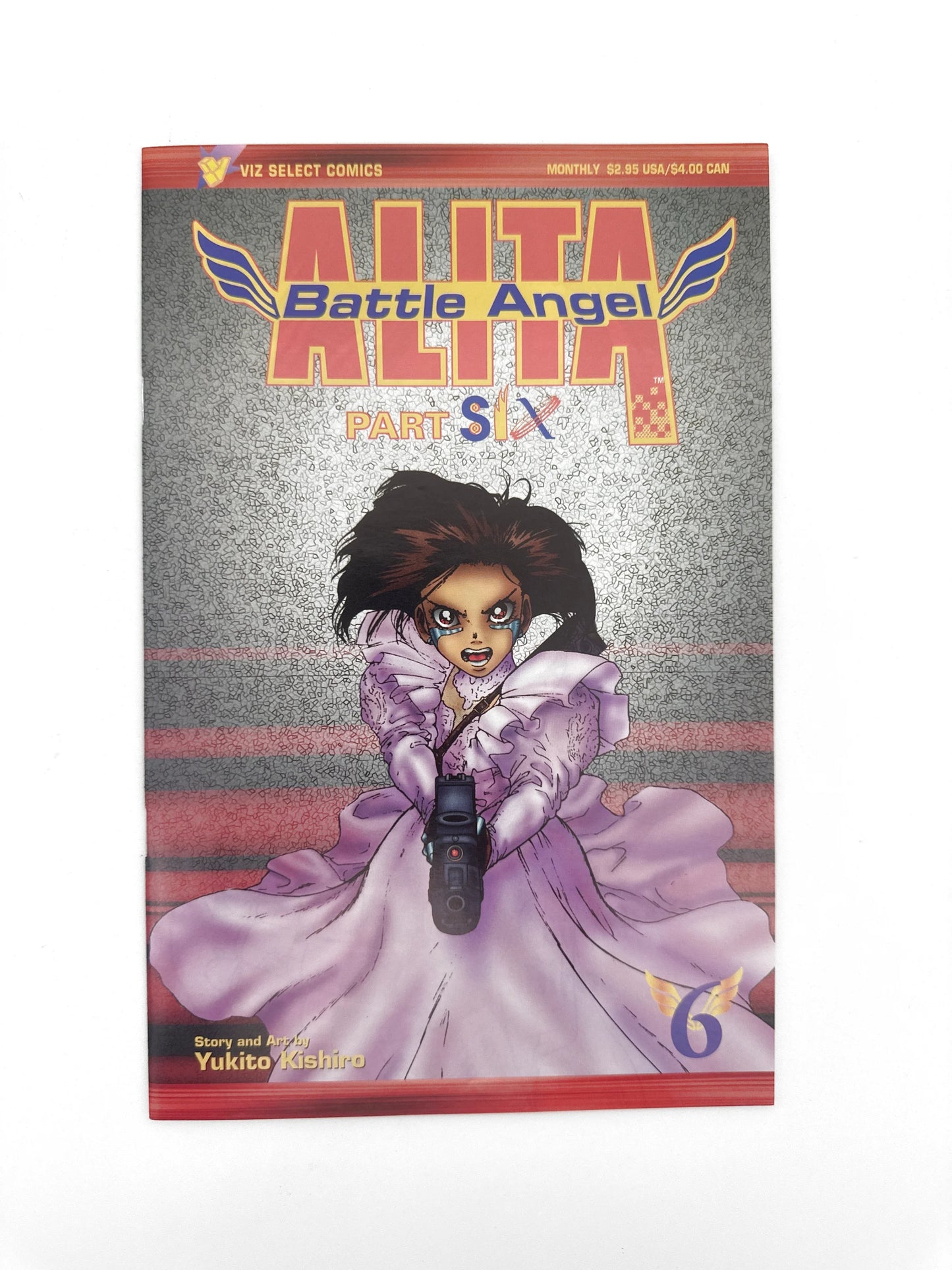 A manga comic book with a stylized title and an illustration of a character in a ruffled dress.