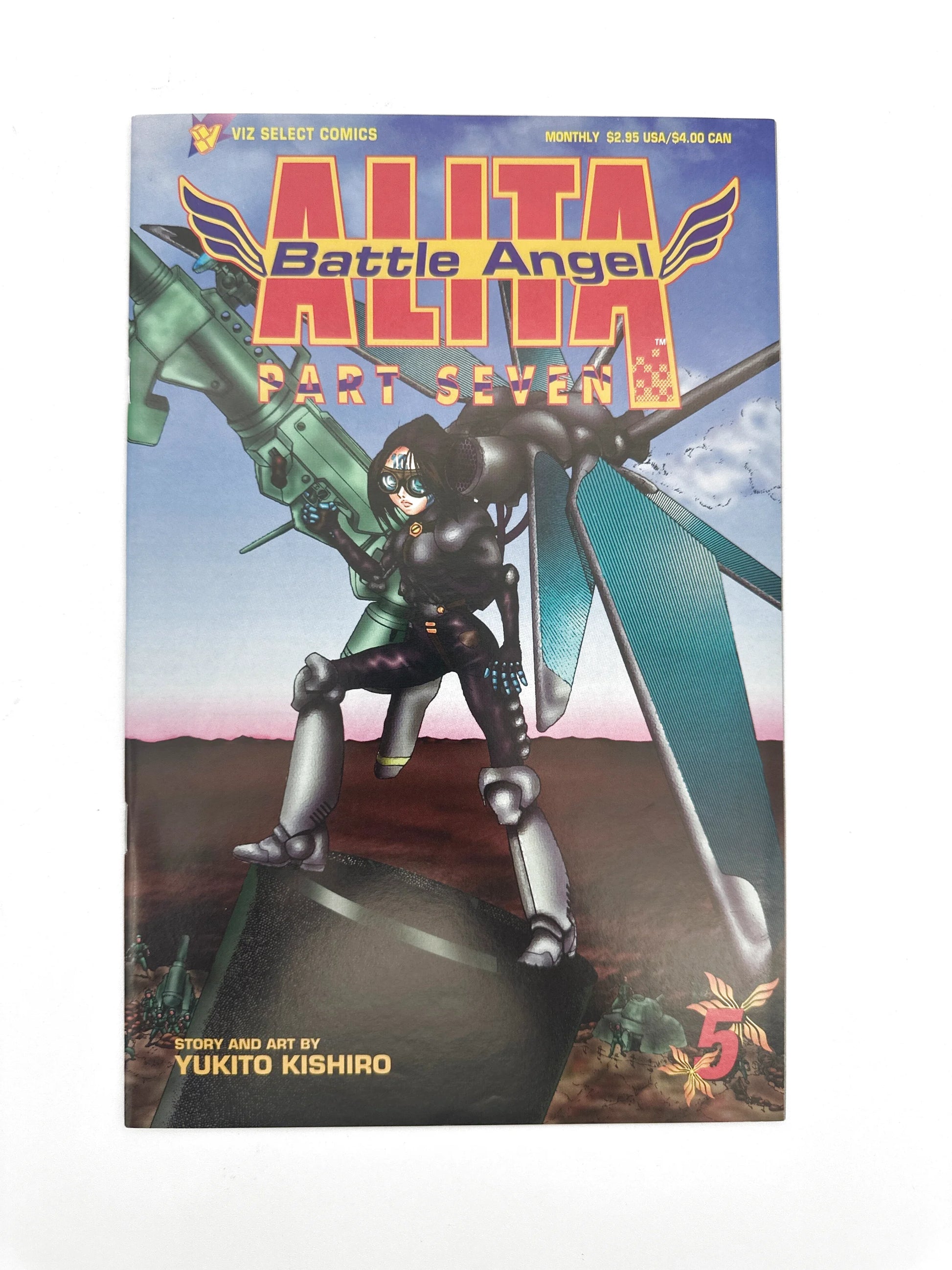 A comic book titled "Alita Battle Angel Part Seven" featuring a female character and a flying vehicle.