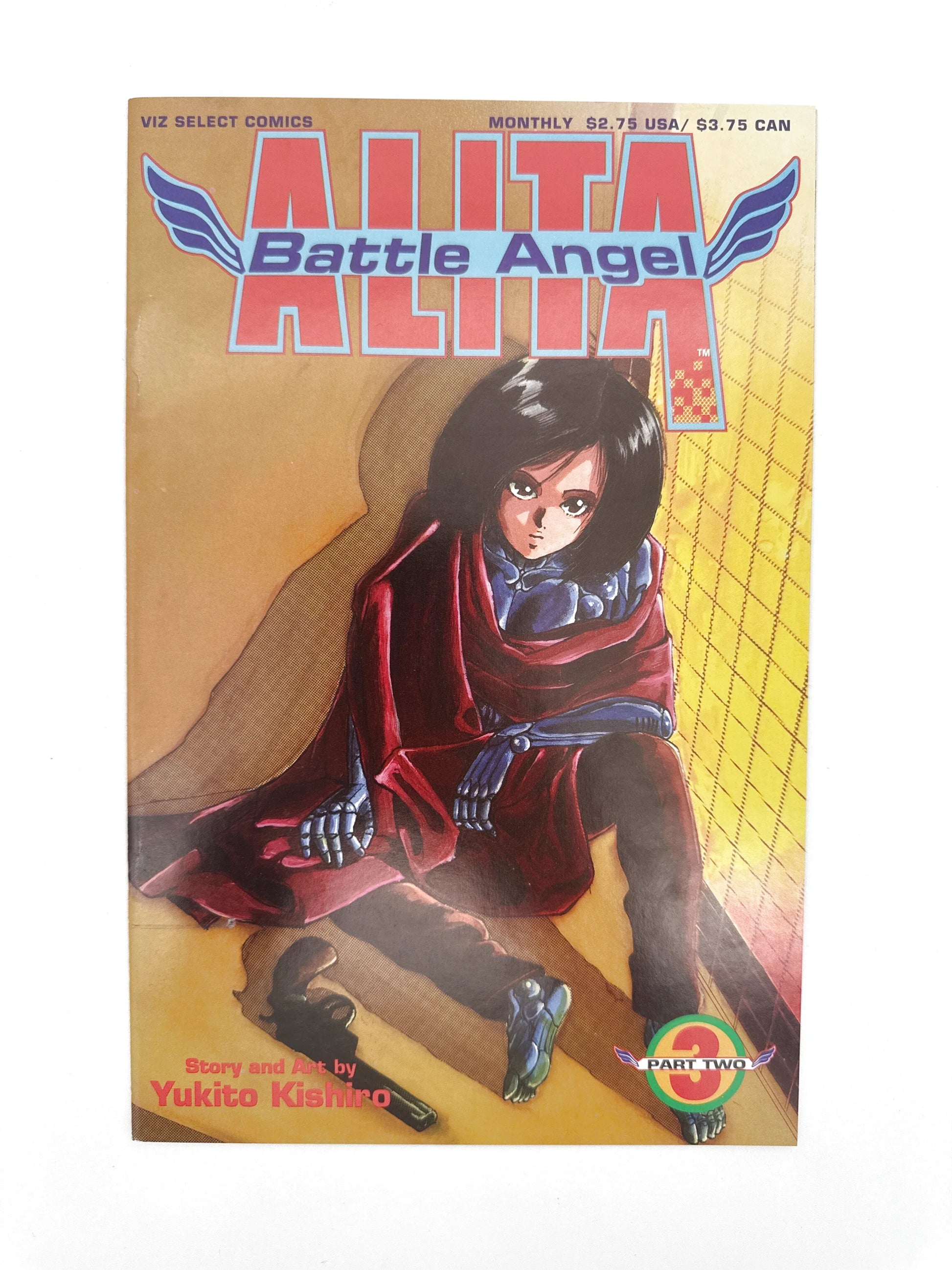 A manga comic book with an illustration of a dark-haired character in a red cloak.